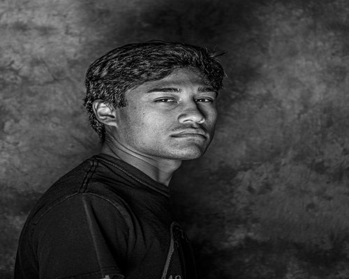 Professional portrait of Alex Reyes, a passionate photographer from the Philippines.